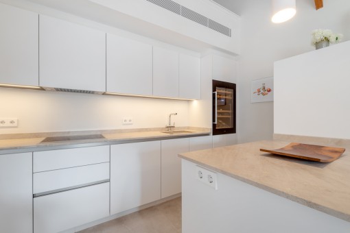 Fully equipped kitchen in white