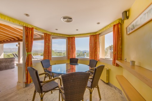 Dining area with access to the pool