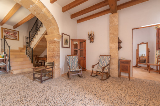 Open reception area with stone flooring and Mares arch