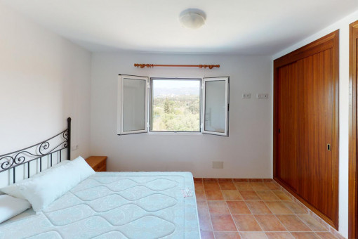 Master bedroom with built-in wardrobe