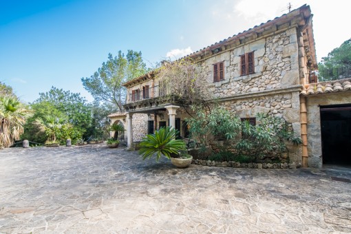 Front view of the main house with stone facade