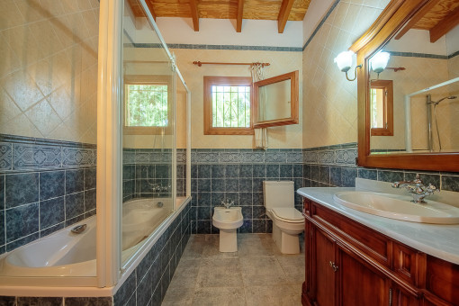 One of 3 bathrooms