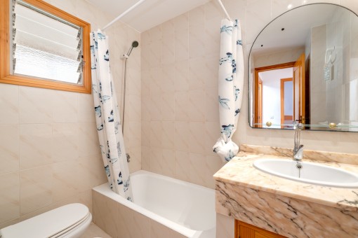 One of 2 bathrooms