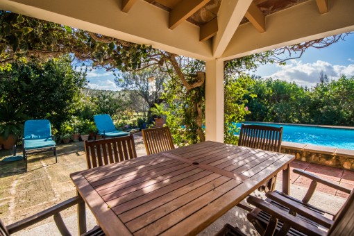 Covered terrace with views to the pool