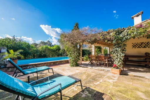 Idyllic sun terrace next to the pool