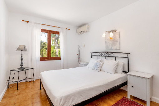 One of 4 bedrooms in the main house