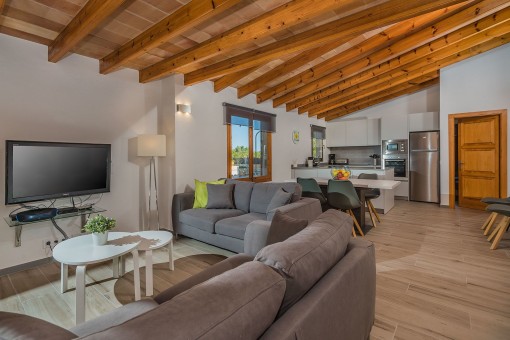 Living and dining area with open kitchen