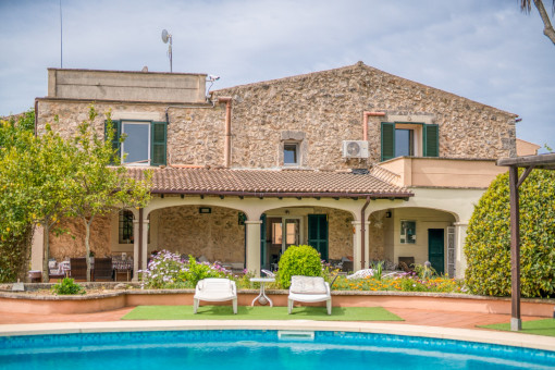 Traditional natural stone finca by Santa Margalida with lovingly landscaped garden and pool