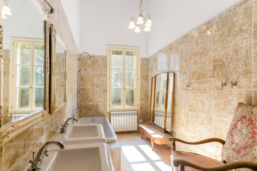 Sunny bathroom with bathtub