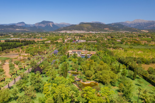 Bird's eye view of the property with large garden