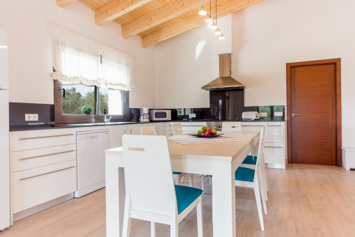 Modern kitchen with dining area