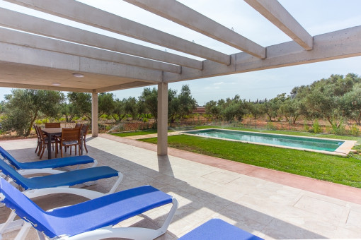 Lounge area on the terrace with views to the pool