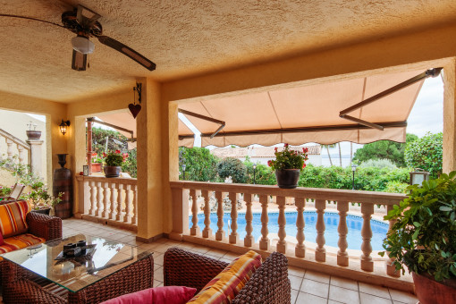 Covered terrace overlooking the pool