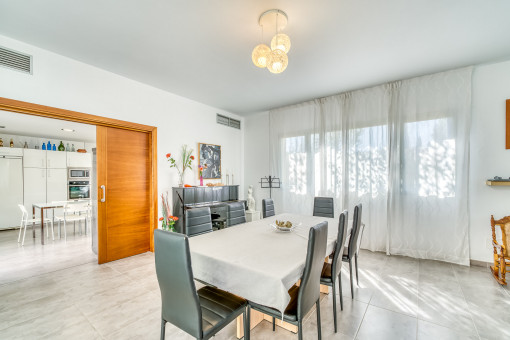 Bright dining area with access to the kitchen