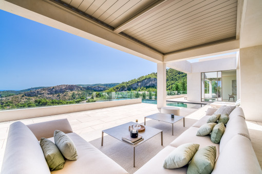 Covered terrace with mountain views