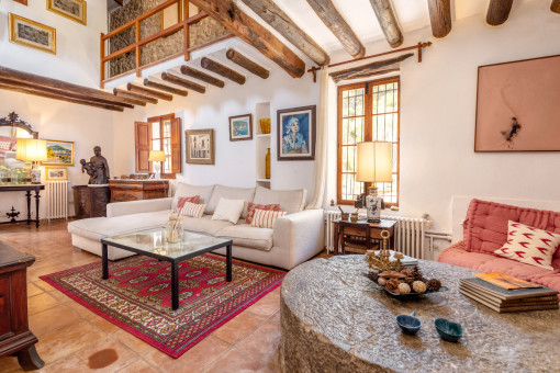 Enchanting living area with wooden ceiling beams