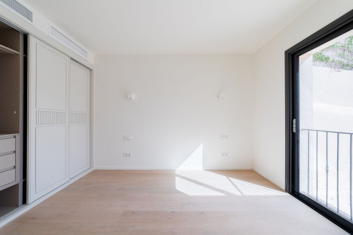 Bedroom with built-in wardrobes