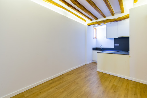 Kitchen with wooden ceiling beams