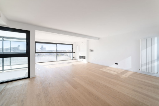 Lightflooded living area with fireplace