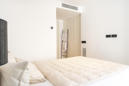 one of three bedrooms