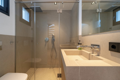 one of three bathrooms