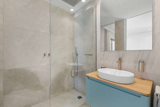 Elegant en-suite bathroom with shower
