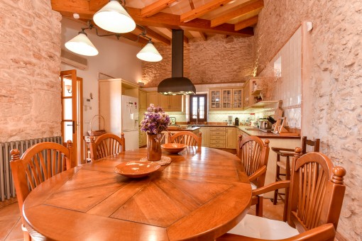 Dining area with natural stone wall