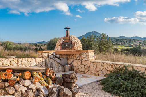 Terrace with baking oven and landscape views