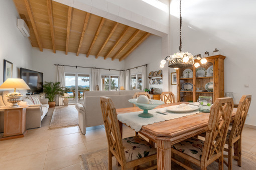 Living and dining area with high ceiling