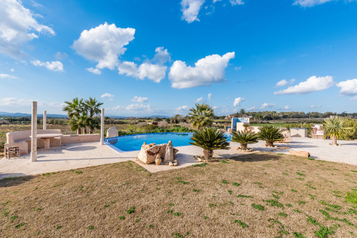 Mediterranean pool area with outdoor shower