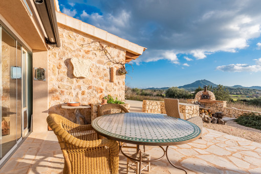 Terrace with seating area and a view