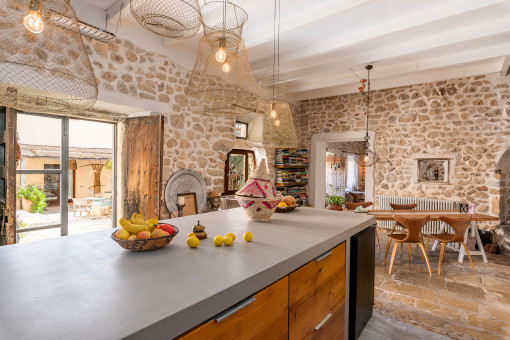 Open kitchen area with terrace access