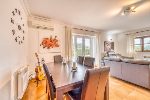 Bright dining area and terrace access