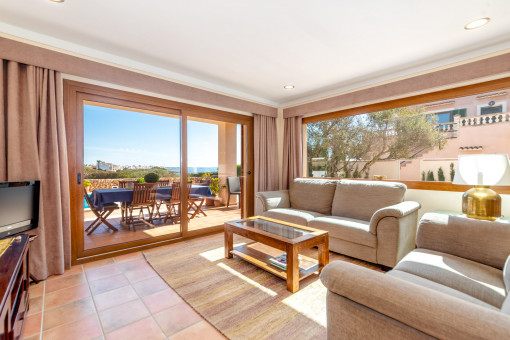 Comfortable living area with terrace access