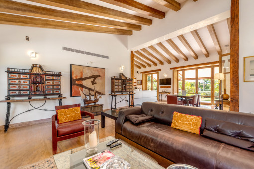 Comfortable living area with wooden ceiling beams