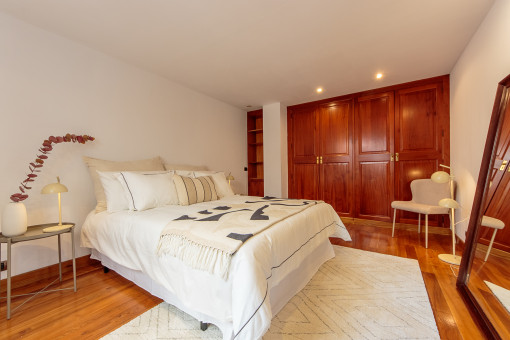 Bedroom with built-in cupboards