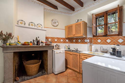 Kitchen with a fireplace