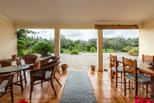 Covered terrace with garden views