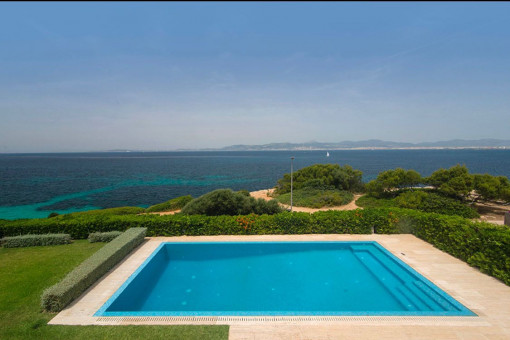 Pool area with sea views