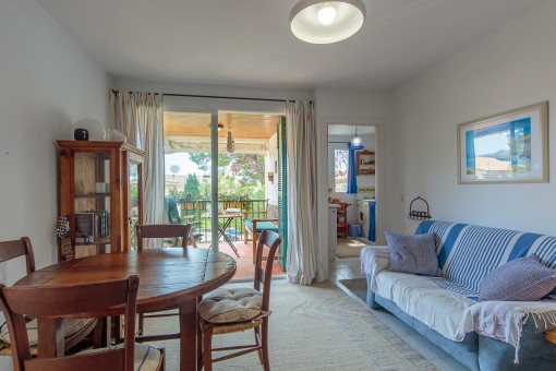 Living and dining area with balcony