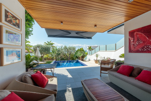 Covered terrace overlooking the pool