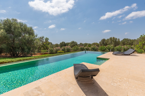 Large pool surrounded by nature