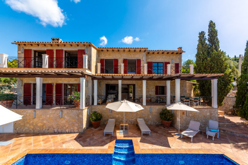 View of the finca with pool and terraces