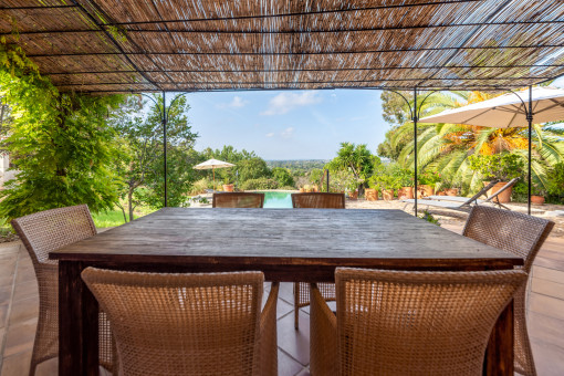 Outdoor dining area with sweeping views