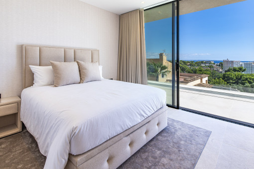 Bedroom with balcony access