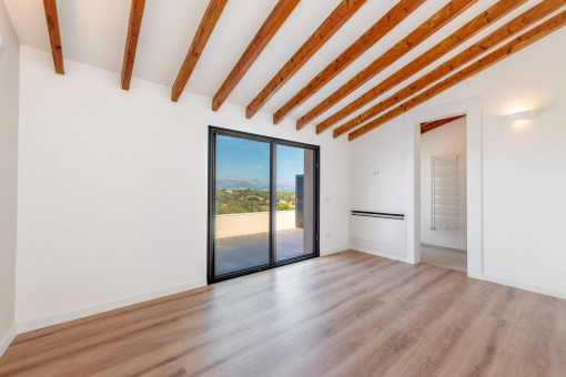 Bedroom with balcony access