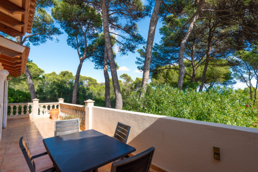 Sunny terrace with outdoor dining area