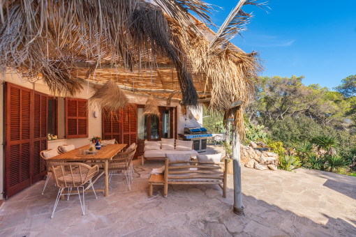 Idyllic terrace with dining and lounge area