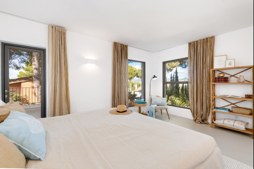 Master bedroom with views of nature