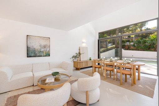 Living and dining area with terrace access